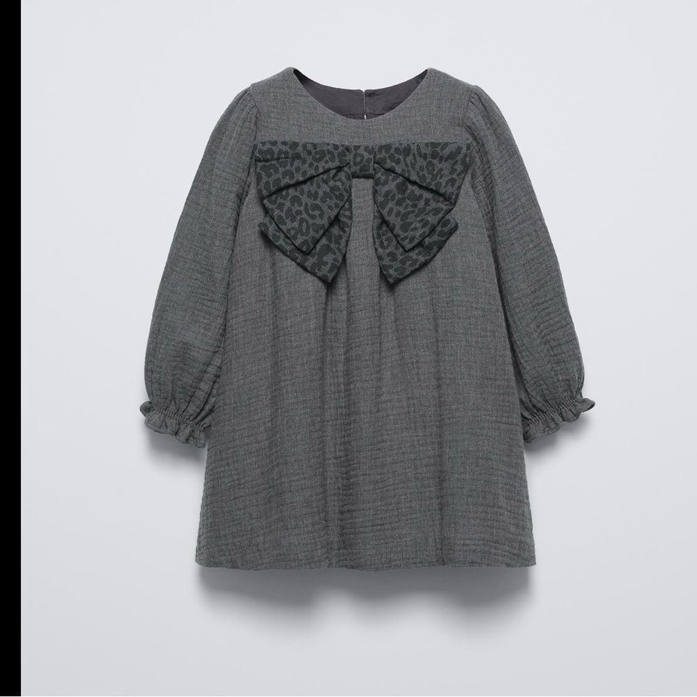 NWT. ZARA BOW ANIMAL PRINT DRESS.Size 5 years